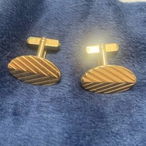 Vintage Men’s Swank oval Goldtone cufflinks with chevron design.